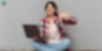 Girl who is very happy that she bought a used good quality laptop for affordable price