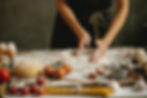 A woman is kneading dough to bake some Diwali goodies : Diwali gift ideas