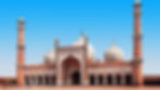 Jama Masjit - Historic mosque with large domes and two minarets under clear blue sky. Red and white facade with intricate arch design, creating a serene atmosphere.